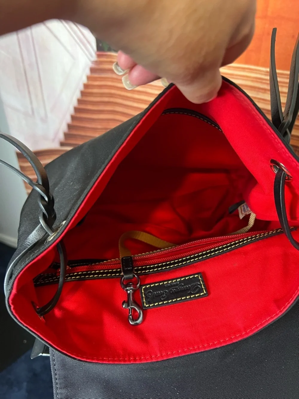 Dooney & Bourke Nylon Flap Backpack features a distinct braided top handle 🌹 - Picture 7 of 13